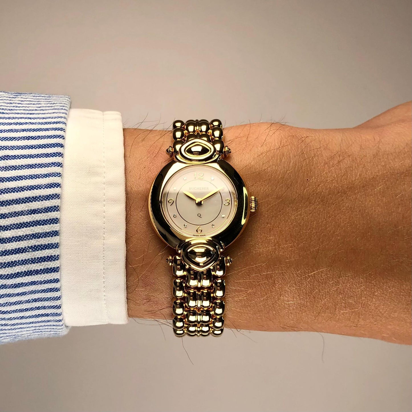 Bucherer Paradiso Armbanduhr in 750 Gold mit Quarzwerk.