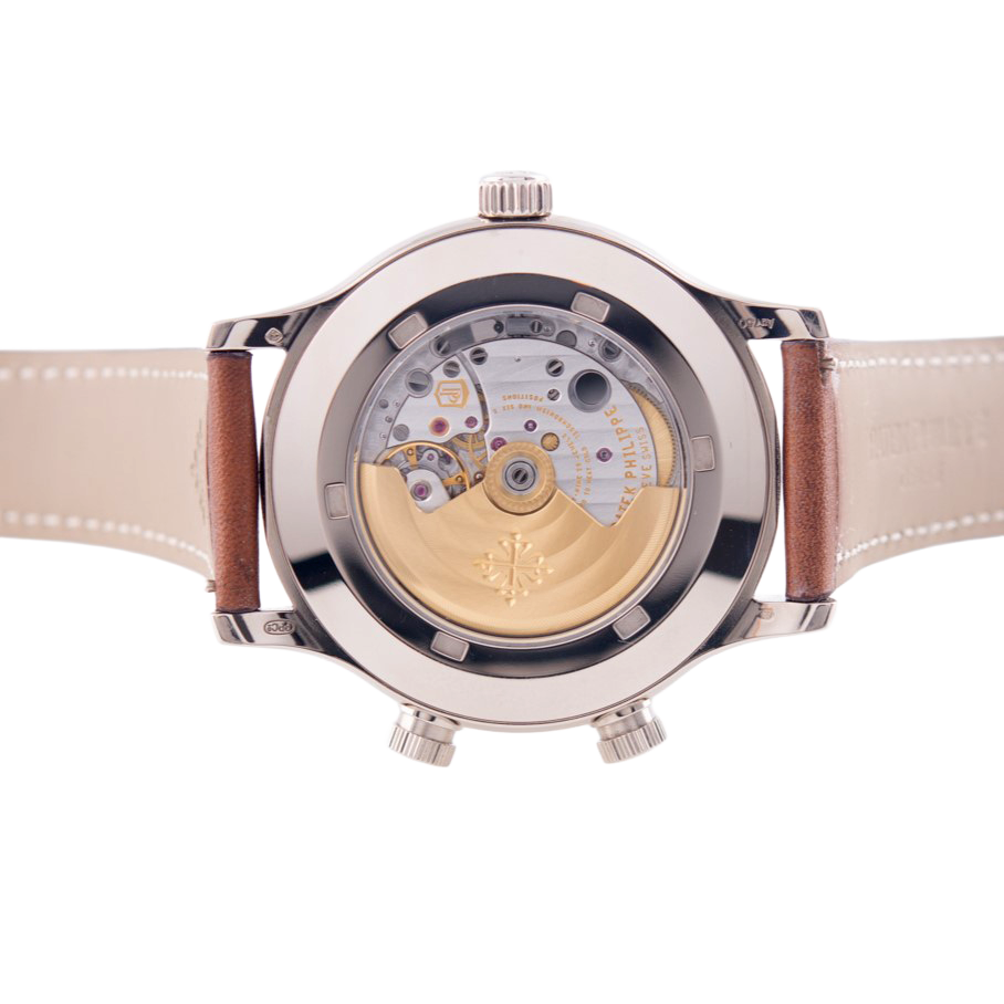 Patek Philippe Pilot Travel Time Armbanduhr
in 750 Weißgold mit Automatikwerk