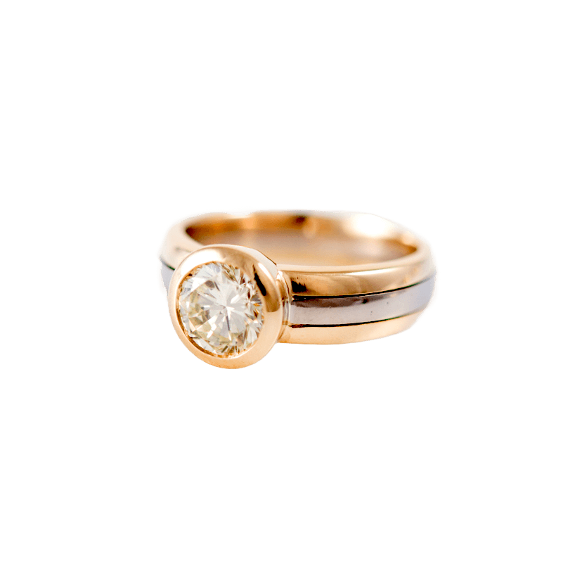 Ring in 750 Gelb- und Weißgold mit einem Brillant