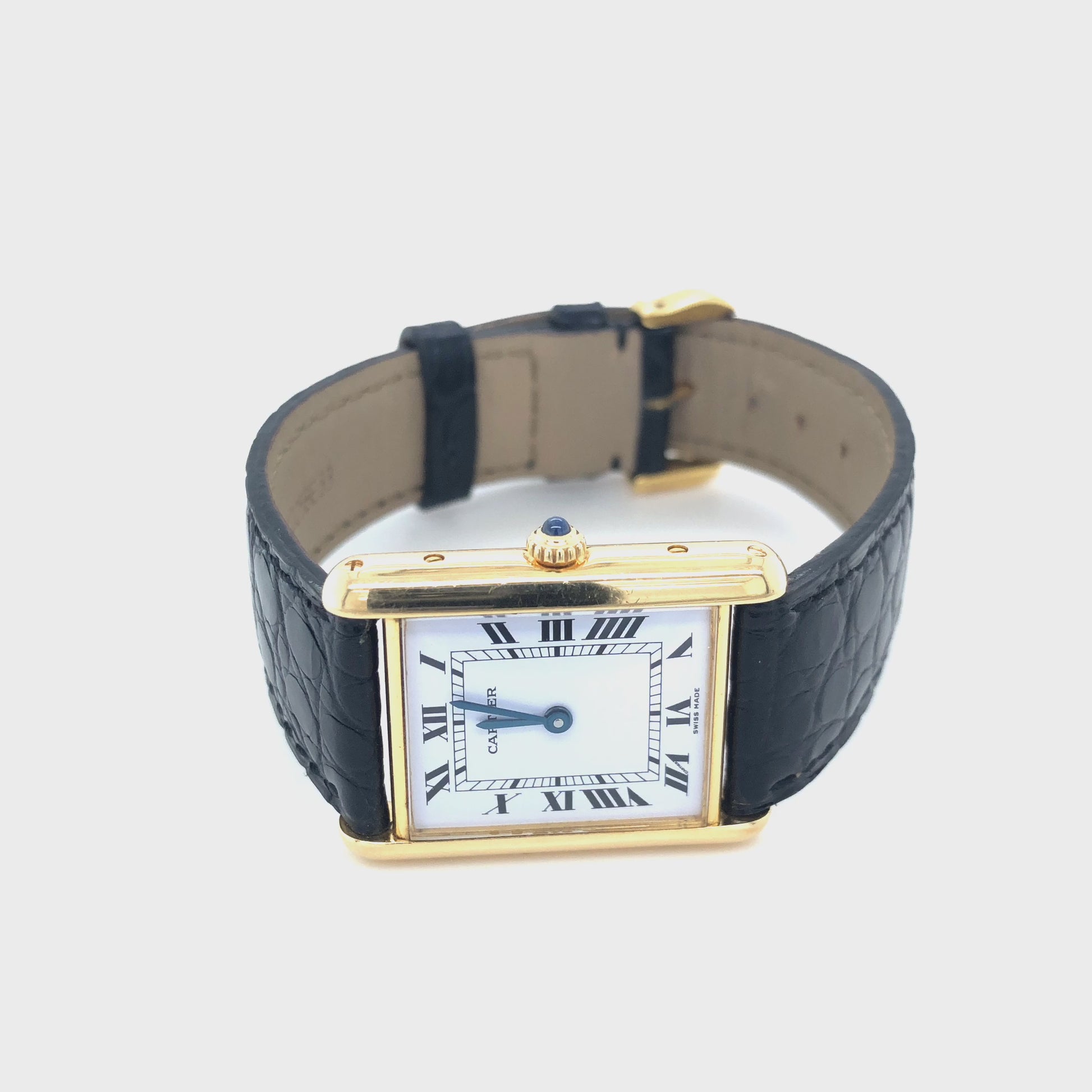 Cartier Tank Armbanduhr in 750 Gelbgold mit Quarzwerk. Weißes Zifferblatt mit römischen Ziffern