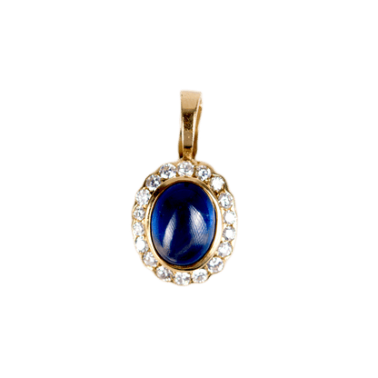 Anhänger an Klappöse in 750 Gelbgold mit einem Saphir Cabochon und 18 Diamanten im Brillantschliff