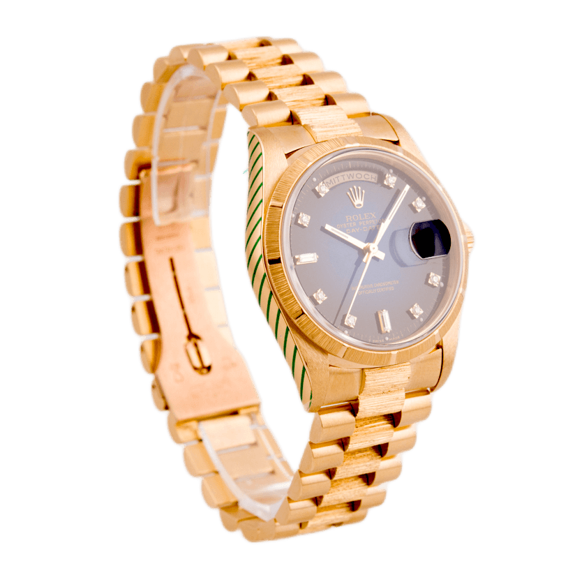 Rolex Oyster Perpetual Day-Date in 750 Gelbgold mit Automatikwerk.