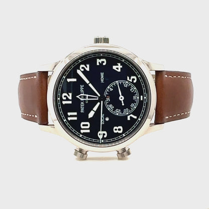 Patek Philippe Pilot Travel Time Armbanduhr
in 750 Weißgold mit Automatikwerk